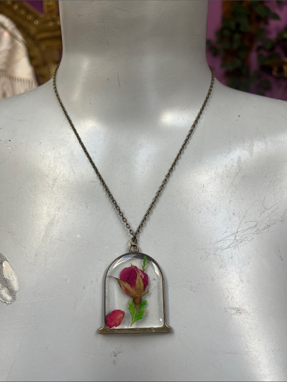 Beauty and the beast red pressed flower brass tone necklace